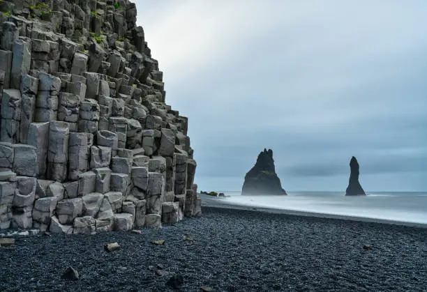Stunning view of Reynisfjara, a world-famous black-sand beach on the South Coast of Iceland.