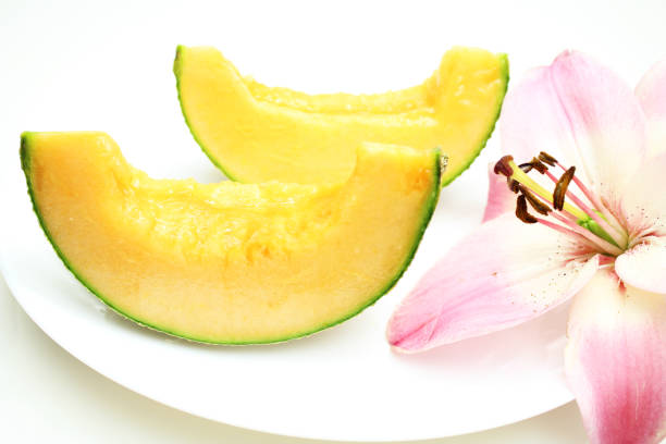 Juicy melon and lily flower.