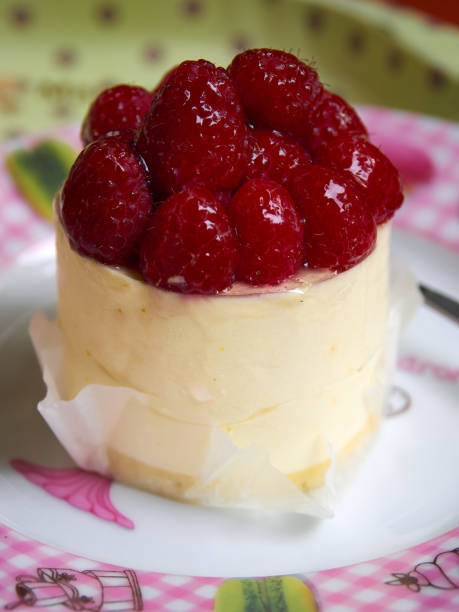 istock Vanilla and fruit cake with raspberry jelly topping 1018114126