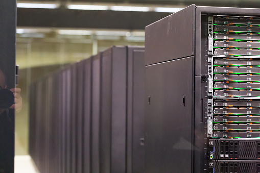 BARCELONA, SPAIN - JANUARY 16, 2018: Server room of Barcelona Supercomputing Center with rows of server racks