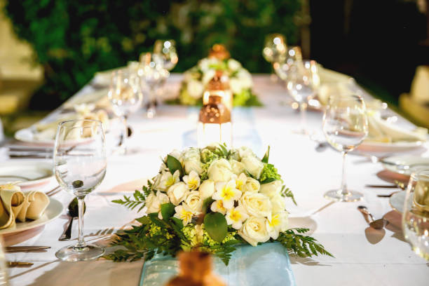 Romantic wedding dinner table setting Romantic wedding dinner table setting wedding feast stock pictures, royalty-free photos & images