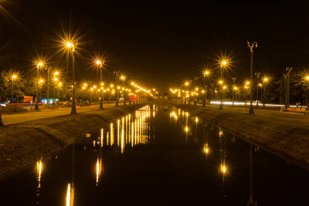 istock Electric light in perspective canal, Night view background 1018133674