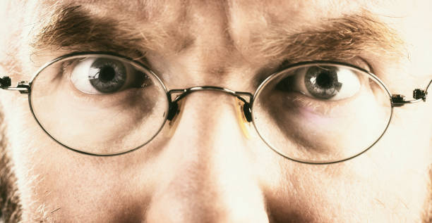 istock Angry looking mature man in spectacles 1018138840