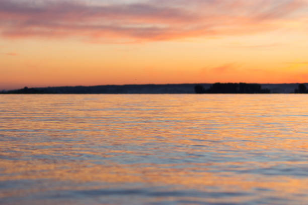 istock beautiful sunset over sea 1018138902