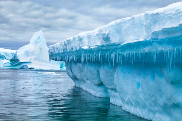 istock global warming and ecological problem concept, ice melting in Antarctica 1018141678