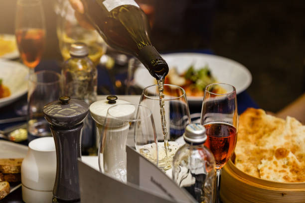 istock The process of pouring champagne into a glass 1018141870