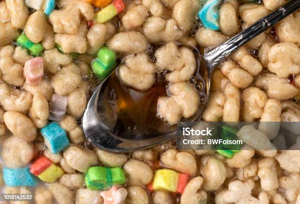 Crunchy Breakfast Cereal With Milk And Syrup Stock Photo - Download Image Now - Blue, Breakfast, Breakfast Cereal