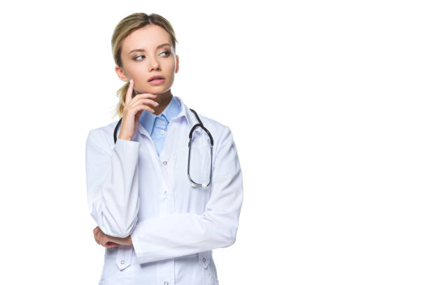 istock thoughtful general practitioner in white coat with stethoscope, isolated on white 1018142818
