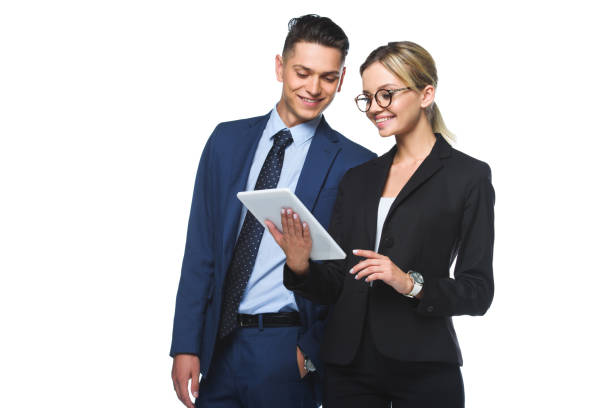 istock young business partners using tablet together isolated on white 1018143294