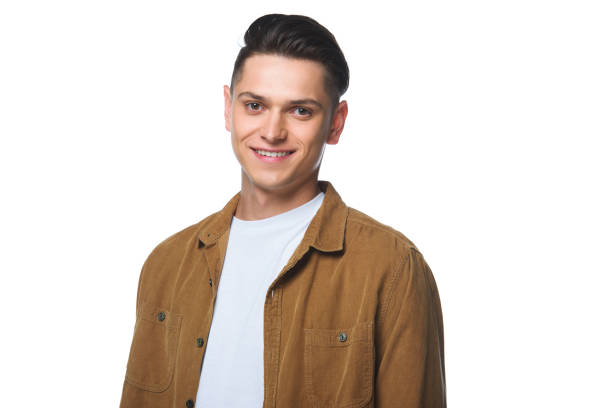 istock handsome young man in stylish shirt looking at camera isolated on white 1018145692