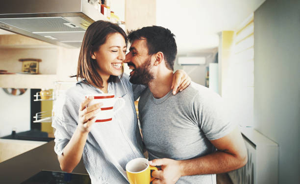 istock Couple having morning coffee at home. 1018152308