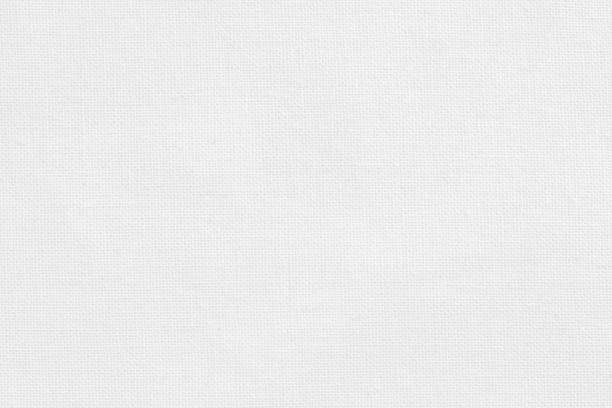 istock White cotton fabric texture background, seamless pattern of natural textile. 1018158540