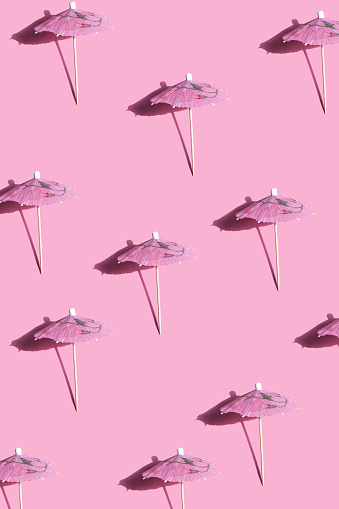 Drink Umbrella pattern on pink background