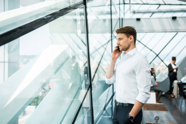 istock Businessman making a phone call in the office 1018169514