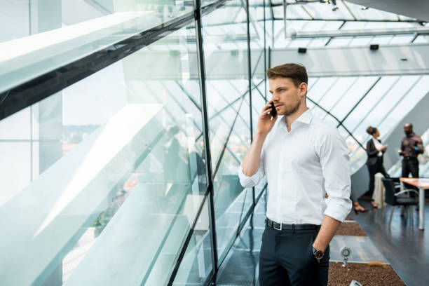 istock Businessman making a phone call in the office 1018171358
