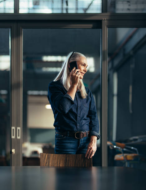 istock Female entrepreneur making a phone call 1018188096