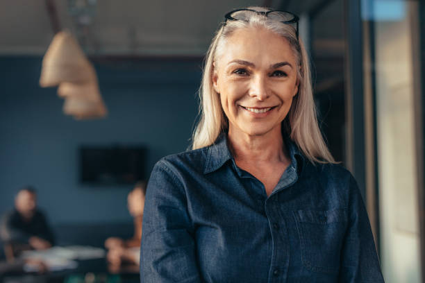 istock Senior business woman in office 1018188212