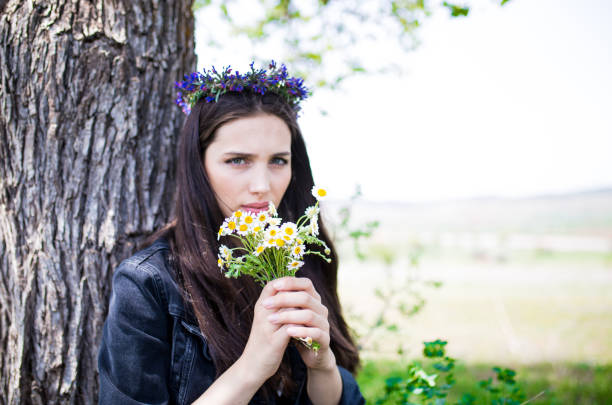 female model photography between flowers