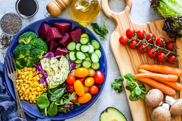 istock Salad mix plate shot from above on light gray marble table 1018198946