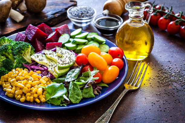 istock Salad mix plate shot on dark brown table 1018199012