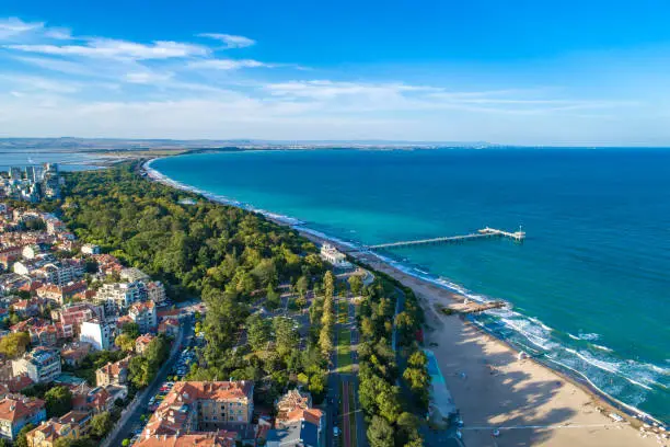 Wide aerial drone view over the sea garden in Burgas, Bulgaria. The scene is situated outdoors near sunset in Burgas, Bulgaria on the Black Sea shores. The photo is taken with DJI Phantom 4 Pro drone.