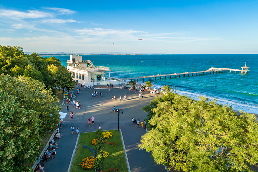 Lively aerial drone view over the sea garden in Burgas, Bulgaria ultra wide shot