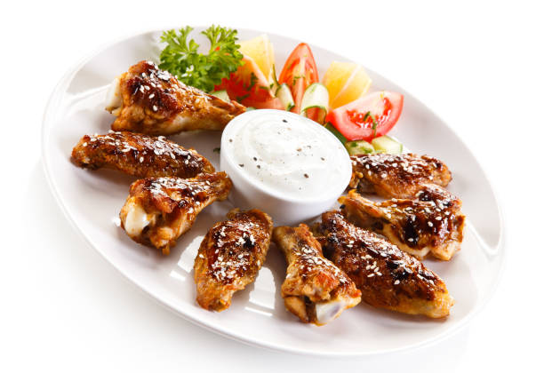 istock Chicken wings and vegetables 1018202970