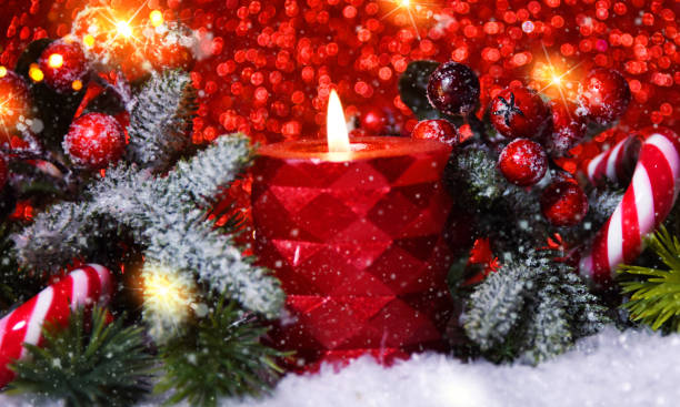 istock Christmas holiday background with candles 1018207748