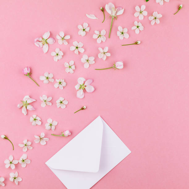 istock Concept of love letter with envelope and flowers 1018210090