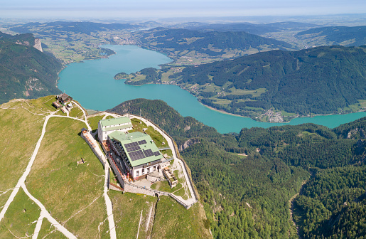 Huge Aerial Panorama of the famous Schafberg with the lake Mondsee and Germany in back. The Schafberg Bahn is the steepest cogwheel railway in Austria and a famous tourist attraction in Austria.