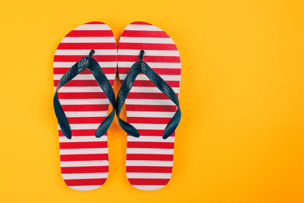 istock Stylish flip flop sandals with USA flag pattern 1018211304