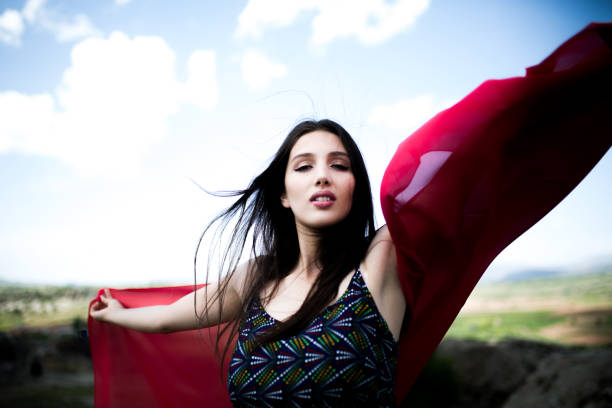 istock a young woman in the spring 1018214038