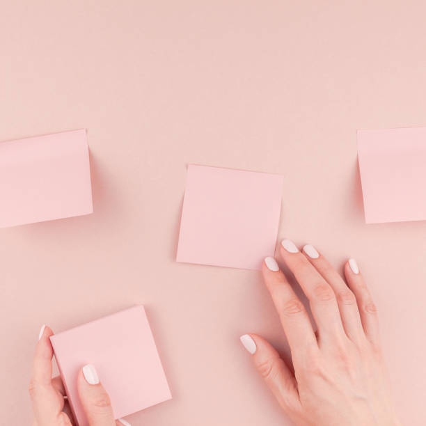 istock Woman hands with paper stickers 1018214078