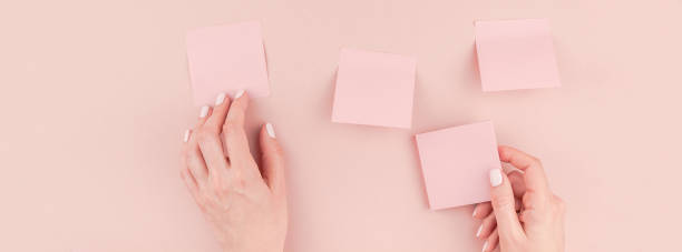 istock Woman hands with paper stickers 1018214100