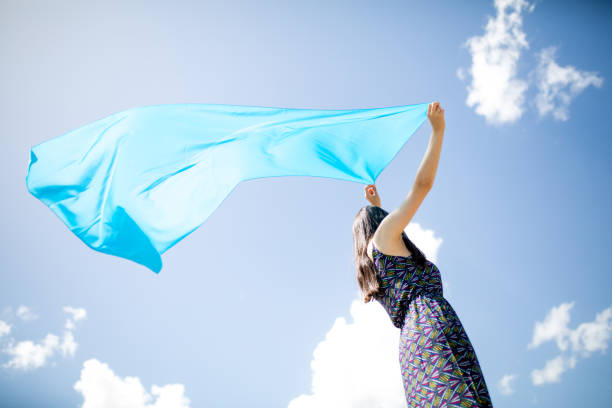 istock a young woman in the spring 1018214160