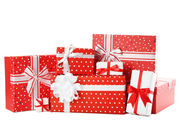 istock Red gift boxes with ribbon isolated on white 1018214182