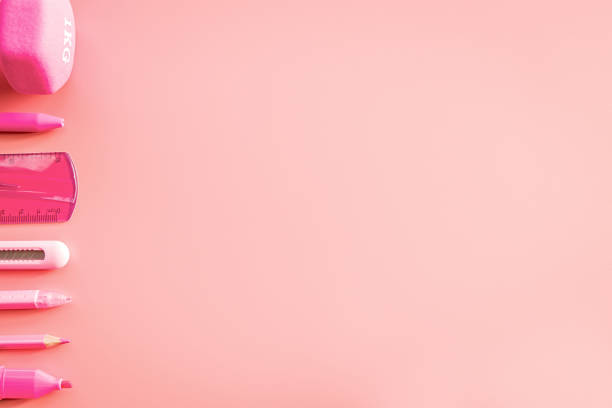 istock pink stationery on pink background with copy space flat lay top view 1018214292