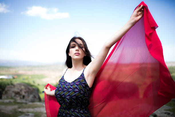 istock a young woman in the spring 1018214400