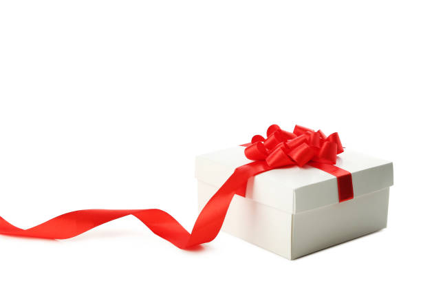 istock White gift box with ribbon isolated on white 1018215466