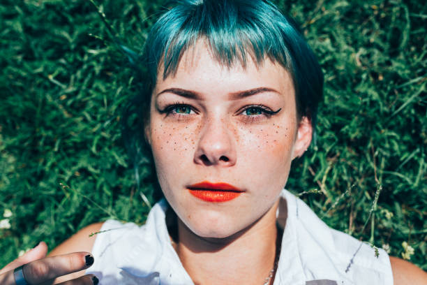 istock Girl with green hair 1018218306