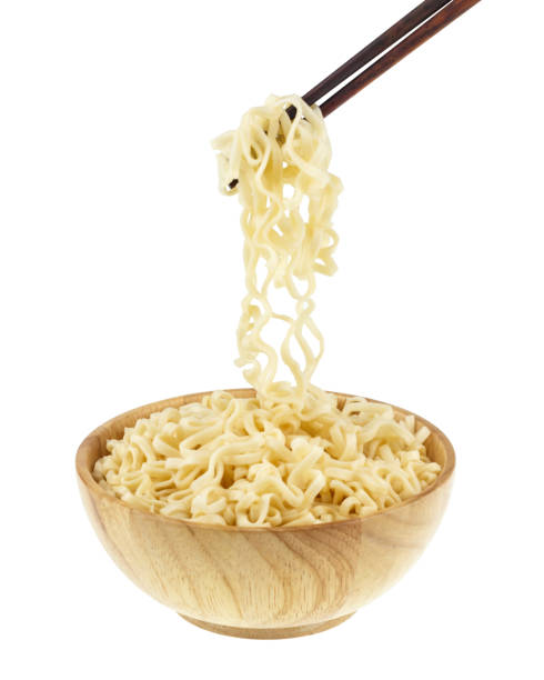 istock instant noodle in a bowl wooden with chopstick on white background, This has clipping path. 1018219420
