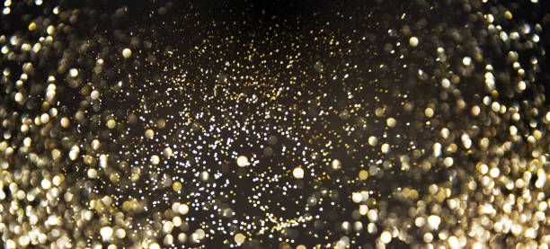 istock Golden (Christmas, New Year) Glitter Lights Defocused Background 1018229776