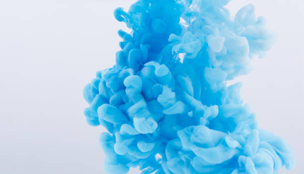 istock Abstract background. Acrylic blue colors and ink in water. 1018237628