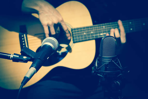 istock microphone recording acoustic guitar sound 1018237710