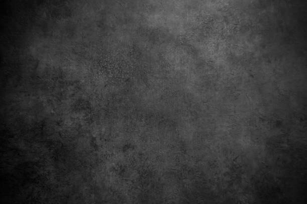 istock abstract black background with rough distressed aged texture, grunge charcoal gray color background for vintage style cards or web backgrounds or brochure backdrop for ads or other graphic art images 1018251582