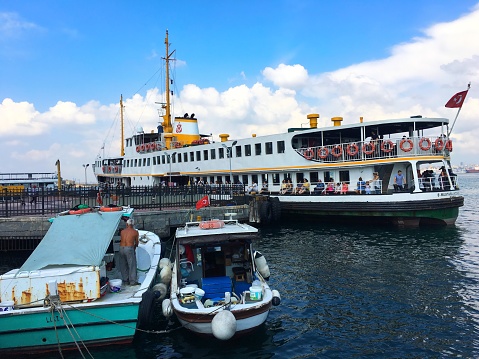Kadikoy, Istanbul, Turkey - August 8, 2018: Ferry is waiting for the passengers for going to Besiktas from Kadikoy pier.