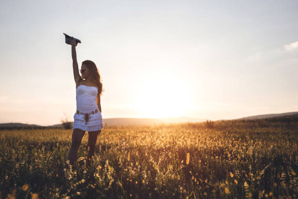 istock Beautiful woman in nature. Copy space. 1018260438