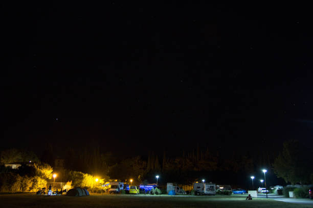 istock view of a campground at night. 1018266138