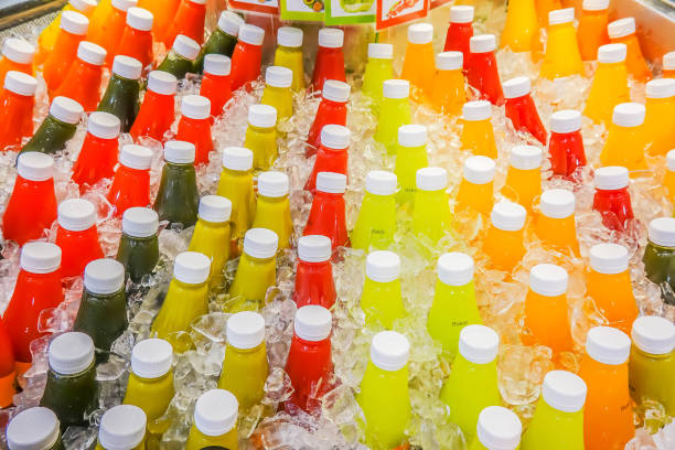 istock Colorful juice beverage with different plastic bottle in supermarkets refrigerator 1018266230