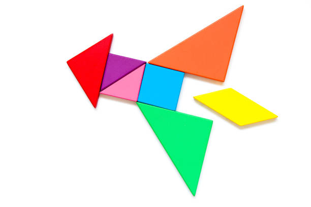 istock Color wood tangram puzzle in rocket shape on white background 1018272844